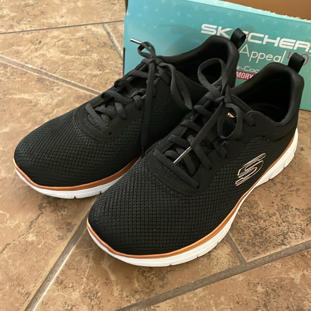Skechers flex appeal black lace up sneakers.  Size 8 & a half.  Great condition.